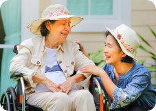caregiver and patient smilng